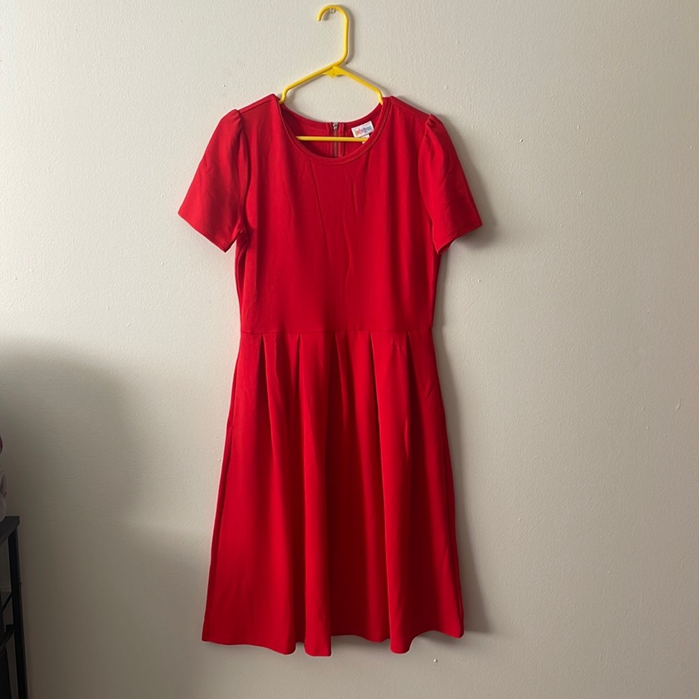 Lula Roe Amelia dress. Has some light creasing from storage. Never worn.